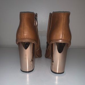 Kristin Cavallari - booties with copper heel.